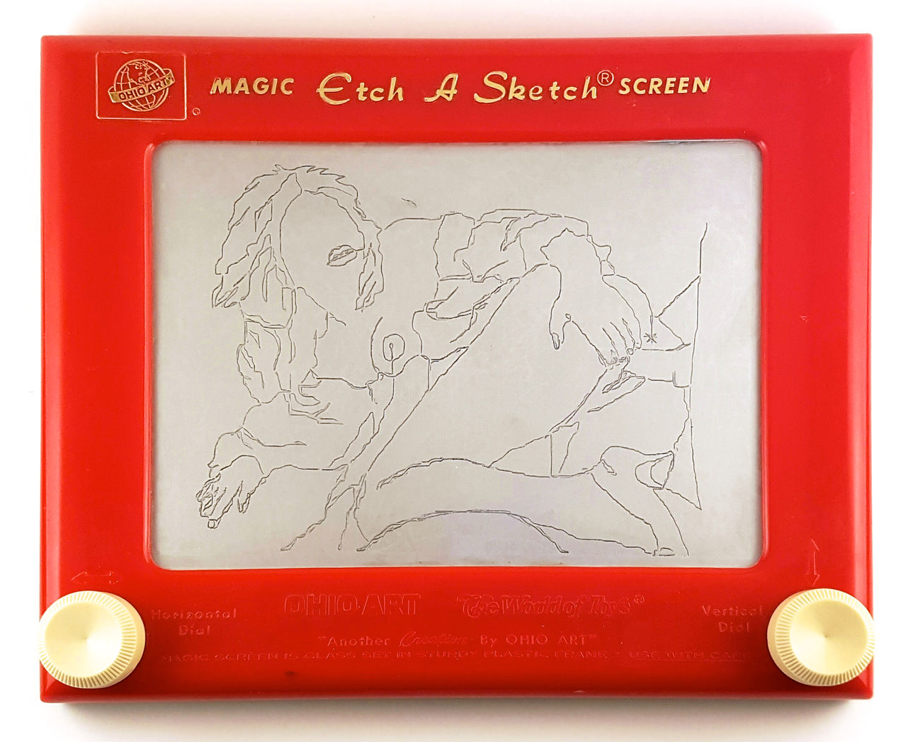 Highly suggestive drawings on an Etch A Sketch